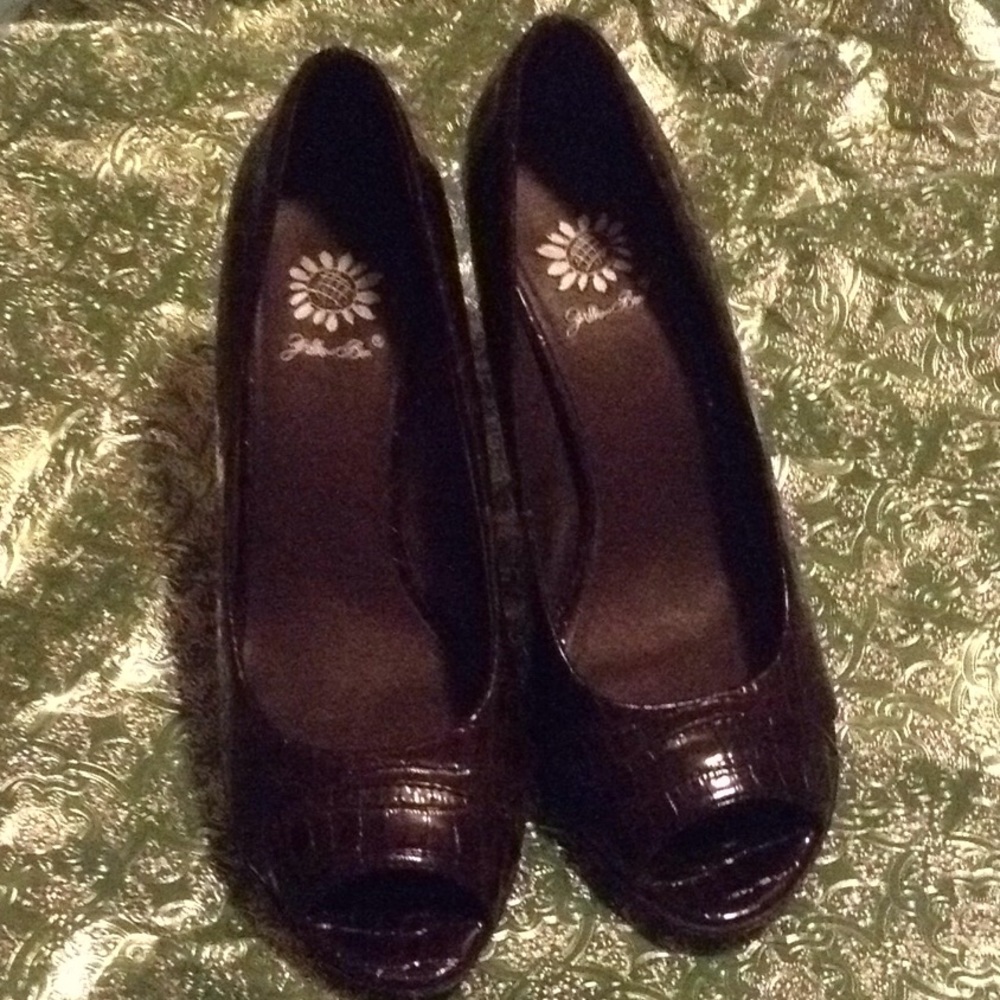 Yellow box high heel , brown shoes .